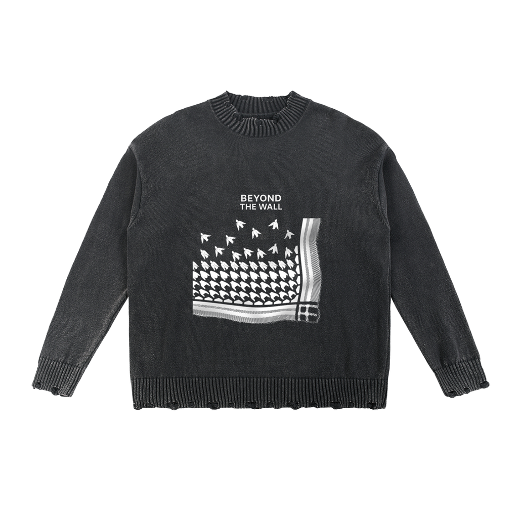 Black sweater with graphic design and text 'BEYOND THE WALL' on a white background